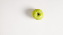 A green apple shown from above