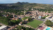 Saint Ambroix Gard France aerial back traveling football stadium swimming pool touristic city