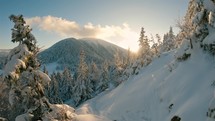 Beautiful frozen winter landscape in snowy alps mountains nature in sunny morning
