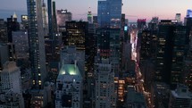 Flying over New york city skyline in evening time aerial view of futuristic city drone shot 4k	