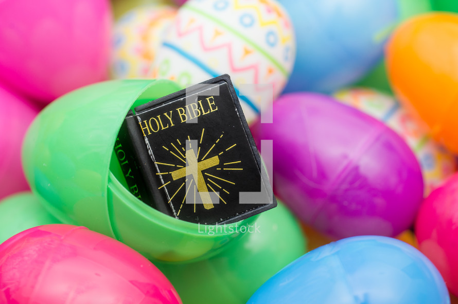 plastic Easter Eggs filled with miniature Holy Bible