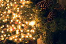 pine garland and lights on a Christmas tree
