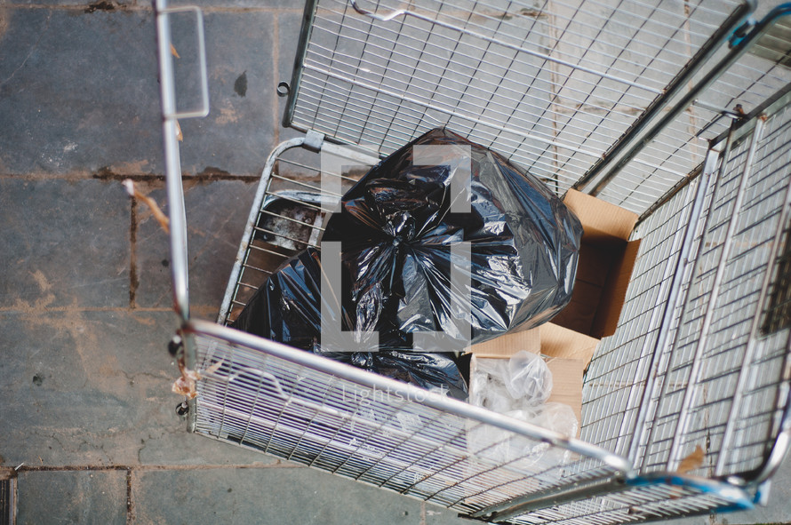 trash in a cage from a building under construction 