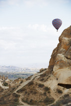 hot air balloons over desert canyons 