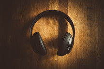 headphones on a wood background 