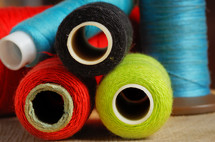colorful spools of thread 