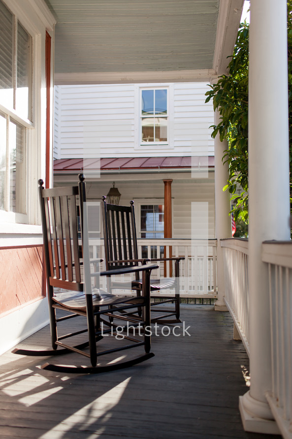 rocking chairs on a porch 