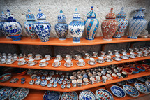 colorful jars and plates in a shop 