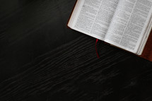 bookmark in the pages of a Bible 