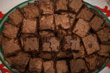 A plate full of brownies.