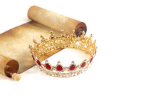 An Antique Scroll with a Royal Crown Isolated on a White Background
