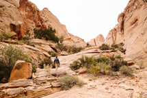 A hiker in a rocky landscape.