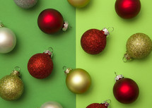 Christmas ornaments on green background 