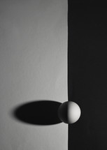 Abstract black and white contrast egg and shadow