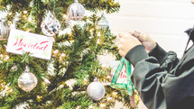 decorating a Christmas tree 