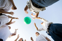 teens tossing a ball