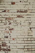 weathered white brick wall 