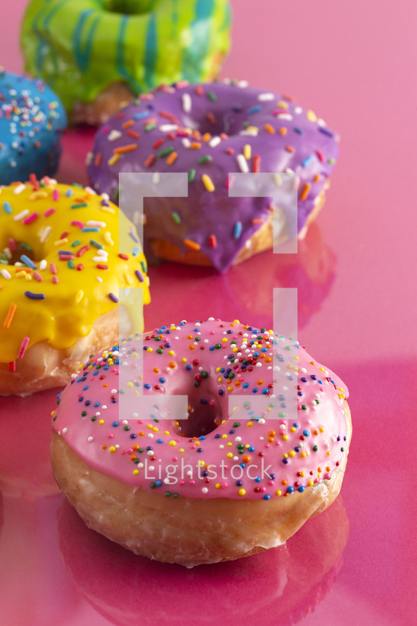 rainbow sprinkled donuts 
