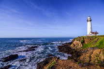 lighthouse along a shoreline 
