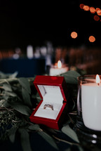 bokeh lights and a ring in a box 