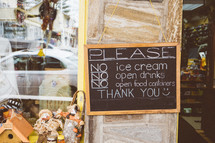 Please no ice cream, no open drinks, no open food containers, thank you sign 