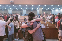hugs and healing in a church 