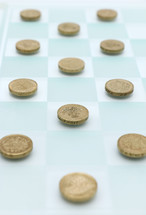 coins on a checker board 