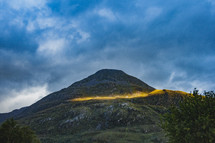 sunlight on a mountain peak 
