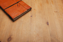leather table on a journal 