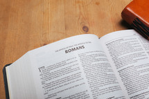 Romans on the pages of a Bible 