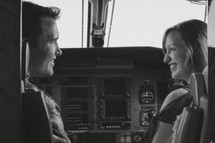 a happy couple in the pilots seat 