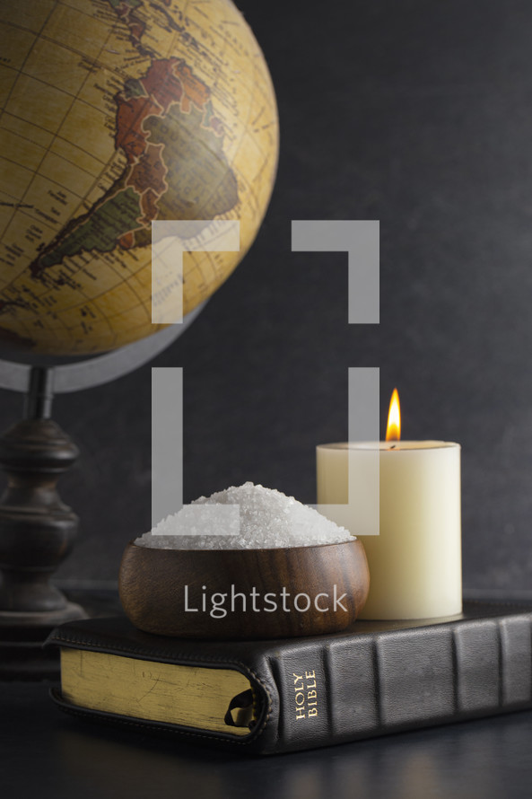 Globe, Bible, candle and salt 