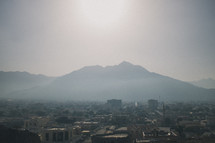 haze over a valley city 