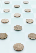 quarters on a checker board