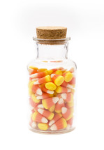 candy corn in glass jar 
