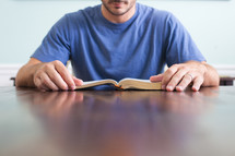 morning devotional - man reading a Bible