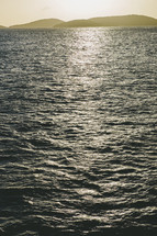 sunlight on the surface of ocean water 