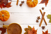 A Fall Themed Border with Real Leaves Pumpkins Spices and Hot Latte