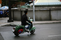 man on a scooter 