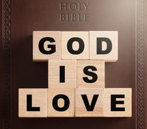 Holy Bible and words God is love 