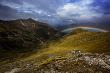 rainbow over a mountain valley 