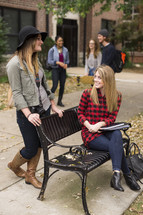 students talking on campus
