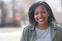 headshot of a smiling African American woman