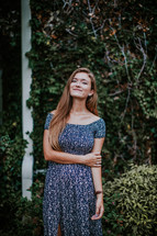 portrait of a smiling teen girl in a dress 