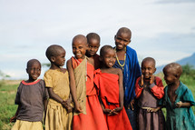 a group of smiling village girls in Africa