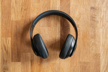 headphones on a wood background 