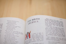 Bible open to the story of "The Birth of Jesus."