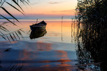 beautiful lake at sunset time and boat