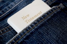 pocket New Testament Bible in a jeans pocket 