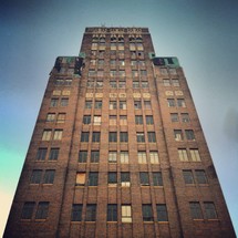 Ground view of historic tall building.